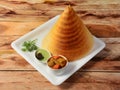 Plain Dosa, a south Indian traditional and popular Breakfast served with chutney and sambar over a rustic wooden background, Royalty Free Stock Photo