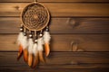 plain dreamcatcher hanging against a wooden wall