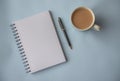 Plain empty notebook with coffee