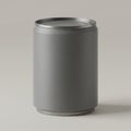 A plain gray aluminum can with a matte finish stands on a light surface. The can is Royalty Free Stock Photo