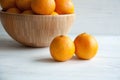 Plain orange mandarins on a grey background