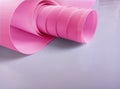 Plain pink flexion roll isolated on a white background Royalty Free Stock Photo
