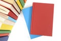 Plain red book, blank, top view, with row of colorful books Royalty Free Stock Photo