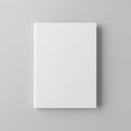 A plain white book is centered against a light gray background. The Royalty Free Stock Photo