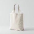 A plain white canvas tote bag with two parallel handles. The bag has a simple, Royalty Free Stock Photo