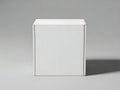 A plain white cardboard box standing against a gray background Royalty Free Stock Photo
