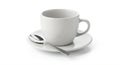 A plain white ceramic cup sits atop a matching saucer. A shiny metal spoon rests on Royalty Free Stock Photo