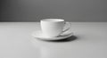 A plain white ceramic cup sits Royalty Free Stock Photo