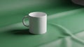 The mug has a simple cylindrical shape with a handle on the side Royalty Free Stock Photo