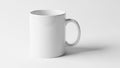 A plain white ceramic mug with a cylindrical shape and a sturdy Royalty Free Stock Photo