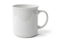 A plain white ceramic mug with a simple handle placed against a neutral background Royalty Free Stock Photo