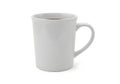 A plain white ceramic mug with a simple handle positioned to the right Royalty Free Stock Photo