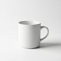A plain white coffee mug on a white background with a subtle shadow Royalty Free Stock Photo