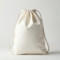 Plain white cotton drawstring bag isolated on white background. Smooth clean fabric with a natural texture. Drawstring closure. Royalty Free Stock Photo