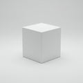 A plain white cube centered on a light gray background. The cube is a perfect geometr Royalty Free Stock Photo
