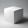 A plain white cube with smooth surfaces sits against a neutral gray background. The Royalty Free Stock Photo