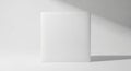 Plain white cube with soft shadows and light on a white background object shape Royalty Free Stock Photo
