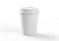 A plain white disposable coffee cup with a fitted plastic lid. Made of paper, the cup stands Royalty Free Stock Photo