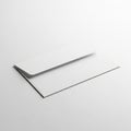 White Envelope Lying Flat on a White Surface with Subtle Shadow letter mail Royalty Free Stock Photo