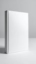 Plain White Hardcover Book Standing Upright with Minimalist Design and Soft Lighting for Text Overlay Royalty Free Stock Photo