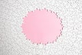 Plain white jigsaw puzzle  on pink  color background, oval shaped frame, abstract backdrop Royalty Free Stock Photo