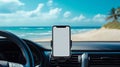 A plain white mock up smartphone screen in a phone holder on a car dashboard Royalty Free Stock Photo