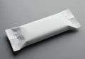 A plain white packet likely containing a single serving snack or candy Royalty Free Stock Photo