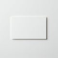 A plain, white rectangular card lies against a slightly textured white background. The Royalty Free Stock Photo