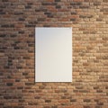 A plain white rectangular poster is centered on a textured brick wall.