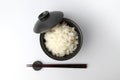 plain white rice in bowl with chopsticks isolated on white background Royalty Free Stock Photo