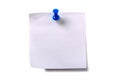 Plain white sticky post note with blue pushpin isolated background Royalty Free Stock Photo