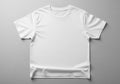 A plain white T-shirt is displayed on a flat surface. It has a crew Royalty Free Stock Photo