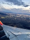 Plain wing and Las Vegas city lights