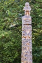 Plain wood totem pole in Vancouver.