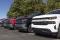 Chevrolet Silverado pickup trucks on display at a dealership. Chevy is a Division of General Motors