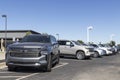 Chevrolet Suburban SUV trucks on display at a dealership. Chevy is a Division of General Motors