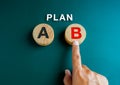 Plan B, Business strategy and decisions concept. Plan, the text over hand that choosing, finger pointing on plan B.