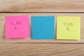 Plan a or plan b on colorful office stickers on wooden desk Royalty Free Stock Photo