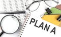 PLAN A - the inscription of text on the Notepad, and chart. Business Royalty Free Stock Photo