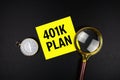 401 Plan text message on sticky note with magnifying glass and compass on black background Royalty Free Stock Photo