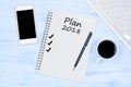 Plan 2018 text on notebook on a wooden table Royalty Free Stock Photo