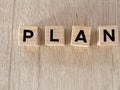 PLAN text on wooden blocks background. For business strategy, solution, analysis, resolutions,marketing and abstract concepts. Royalty Free Stock Photo