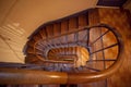 A plan view of a spiral wooden staircase