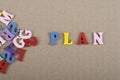 PLAN word on wooden composed from colorful abc alphabet block wooden letters. Royalty Free Stock Photo