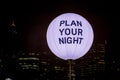 Plan your night written on a sphere at night. City night life concept. Planning ahead safety Royalty Free Stock Photo