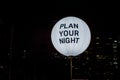 Plan your night written on a sphere at night. City night life concept. Planning ahead safety Royalty Free Stock Photo