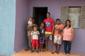 Planaltina, Goias, Brazil-August 23, 2018: A family of seven standing in front of their new home