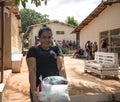 A woman who received a basic food kit donation Royalty Free Stock Photo