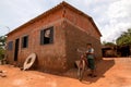 Planaltina, GoiÃÂ¡s, Brazil-October 27, 2018: A boy outside his home with his bike