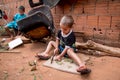 Planaltina, GoiÃÆÃÂ¡s, Brazil-August 4, 2018: A little boy playing with a knife